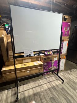 Double sided reversible whiteboard