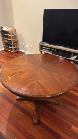 Used round dinning table with glass top. Table and top only. Asking $100 OBO