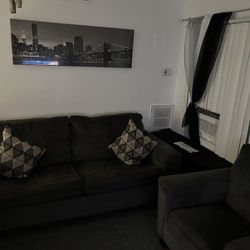 Love seat and sofa and curtains pictures and mirror