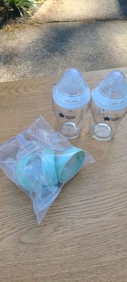 2 glass bottles and new nipples that are faster flow .