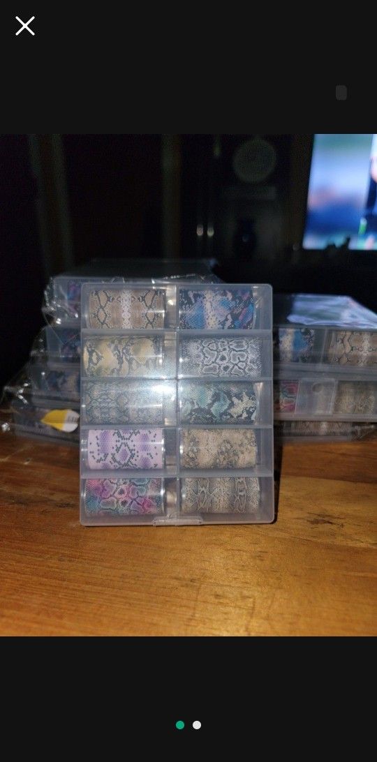 ποΈ 10 DIFFERENT NAIL FOILS ROLLS IN A REUSABLE BOX. $8 PER BOX