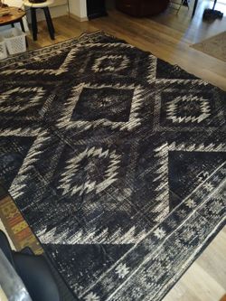 10x8. Synthetic blend area Rug black and white