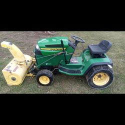Tractor With Snowthrower And Cutting Deck