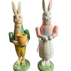 Its Mr and mrs Bunny made of wood 11”. T-175