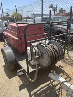 Industrial Weed Sprayer Trailer With A Hose And Reel