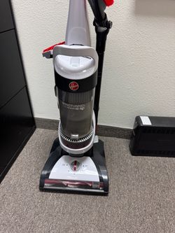 As new vacuum Hoover Windtunnel with all attachments