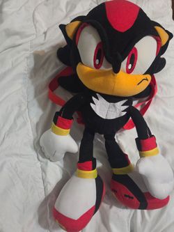 Sega 18" Shadow the Hedgehog plush backpack featuring adjustable straps and a small zippered compartment.