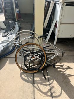 Assorted bike frames and parts