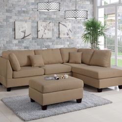 REVERSIBLE SECTIONAL SOFA WITH OTTOMAN SAND LINEN (P7605)  $399 Pick it up location / industry    