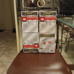 Motion Security Lights ,brand new .All 4 boxes for