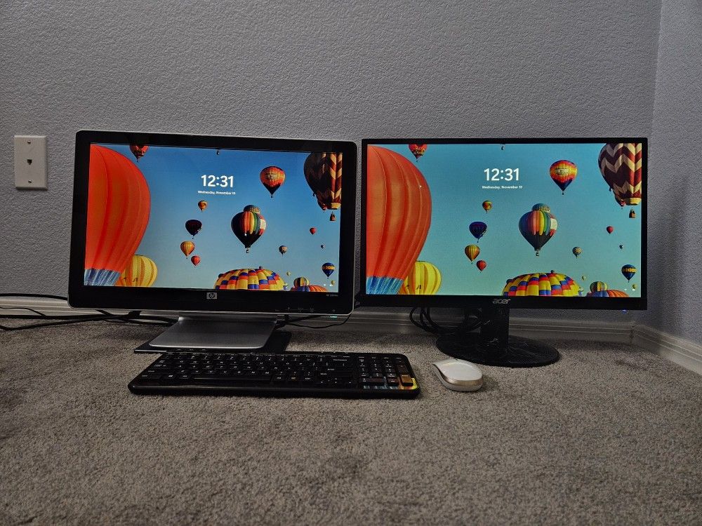 (2) monitors one
22-inch Acer LED (new never used) and one 20-inch HP monitor. Wireless keyboard and mouse. 