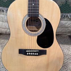 Six String Acoustic Guitar 