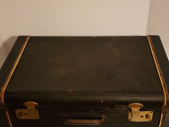 Vintage Suitcase In Distressed Condition