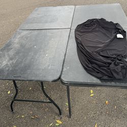Two 10x10 Black Tables With One Black Cover