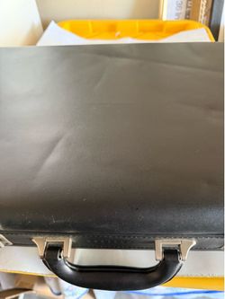 Black brief case with number lock