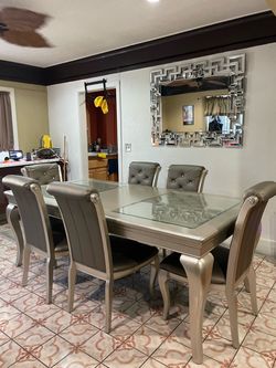 Diner table with chairs and mirror
