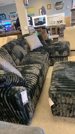 Ashley Midnite madness 2 pc was $1999 now $1200.  Really nice and new.