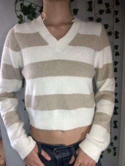 white and beige fluffy sweater