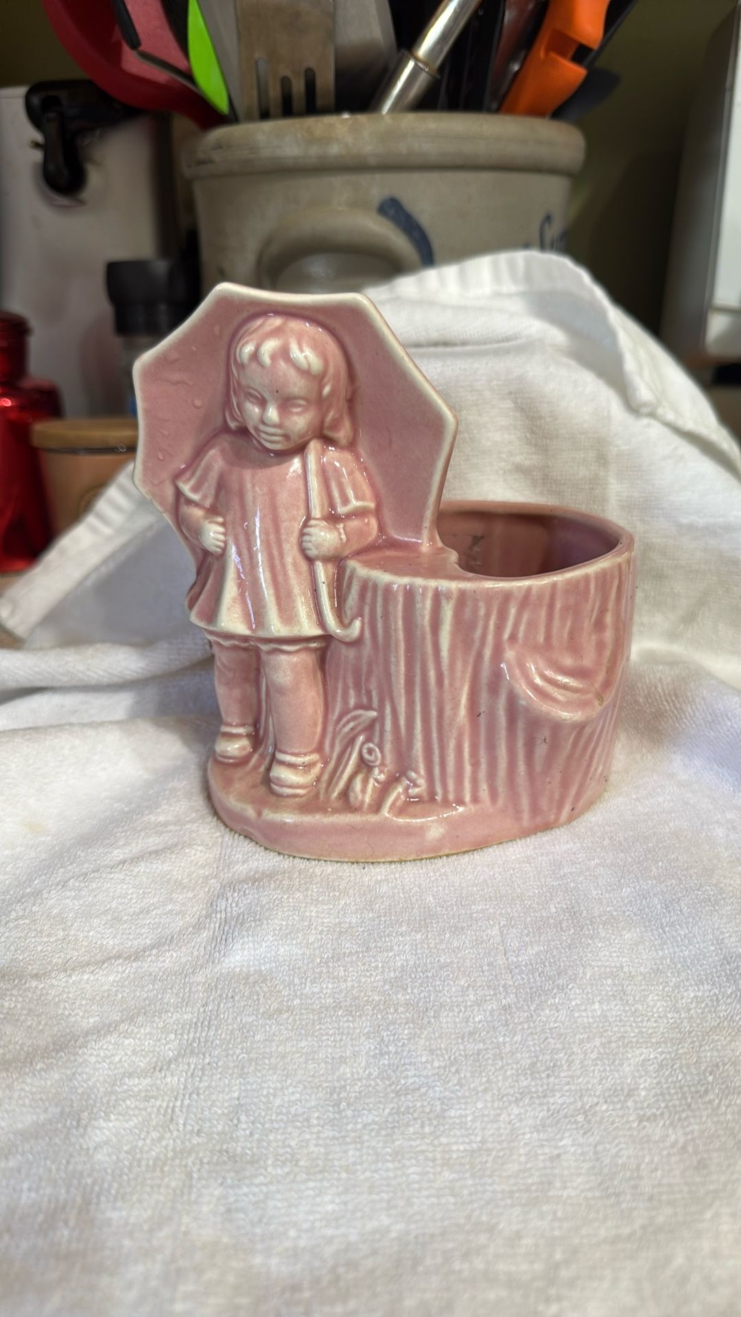 Pink ceramic girl planter 