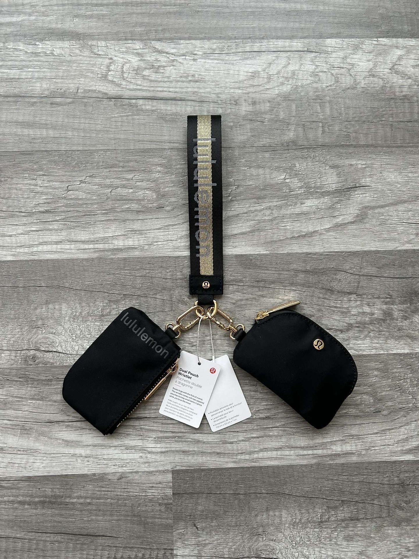 Lululemon Dual Pouch Wristlet Black and Gold Wordmark New With Tags