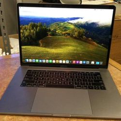 Apple MacBook Pro 15" 2019 Touchbar 8 Core i9 32gb 512GB SSD Dual GPU