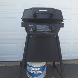 Grill And Propane Tank