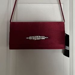 It’s A Beautiful Evening Clutch The Color Is Red. It’s Brand New Never Been Used.
