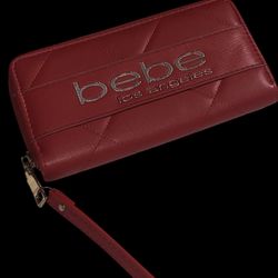 Bebe Los Angeles quilted red zip-around wristlet wallet. 