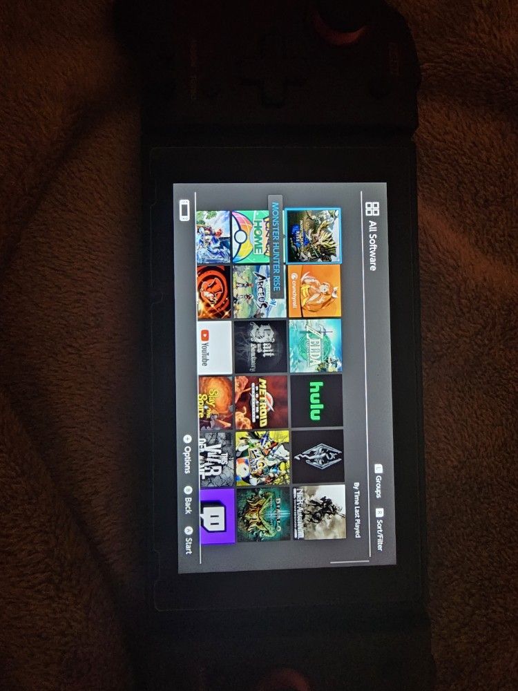 Nintendo Switch with accessories and my Nintendo account with 100 games