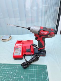 Milwaukee Cordless Impact Driver with Charger