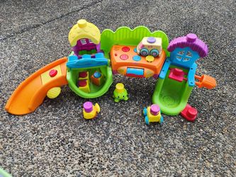 Fisher P6235 Fisher- Stack N Surprise Blocks Songs Smiles