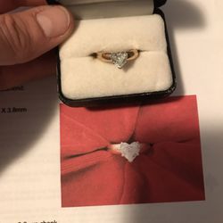14 k heart shaped Diamond ring with papers