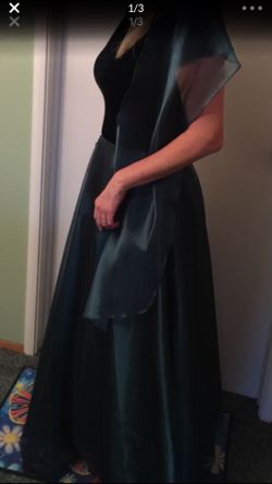 Full length dark green gown.