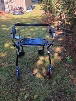 Rolling walker four wheeled.