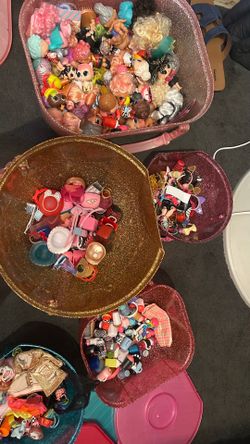 various AUTHENTIC LOL dolls.