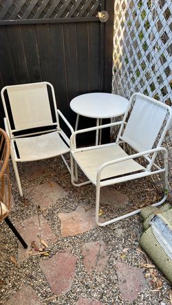 White metal table and chairs