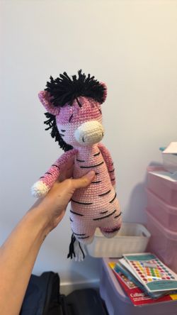 Knitted zebra doll
