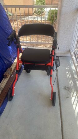 Walker with chair and compartment