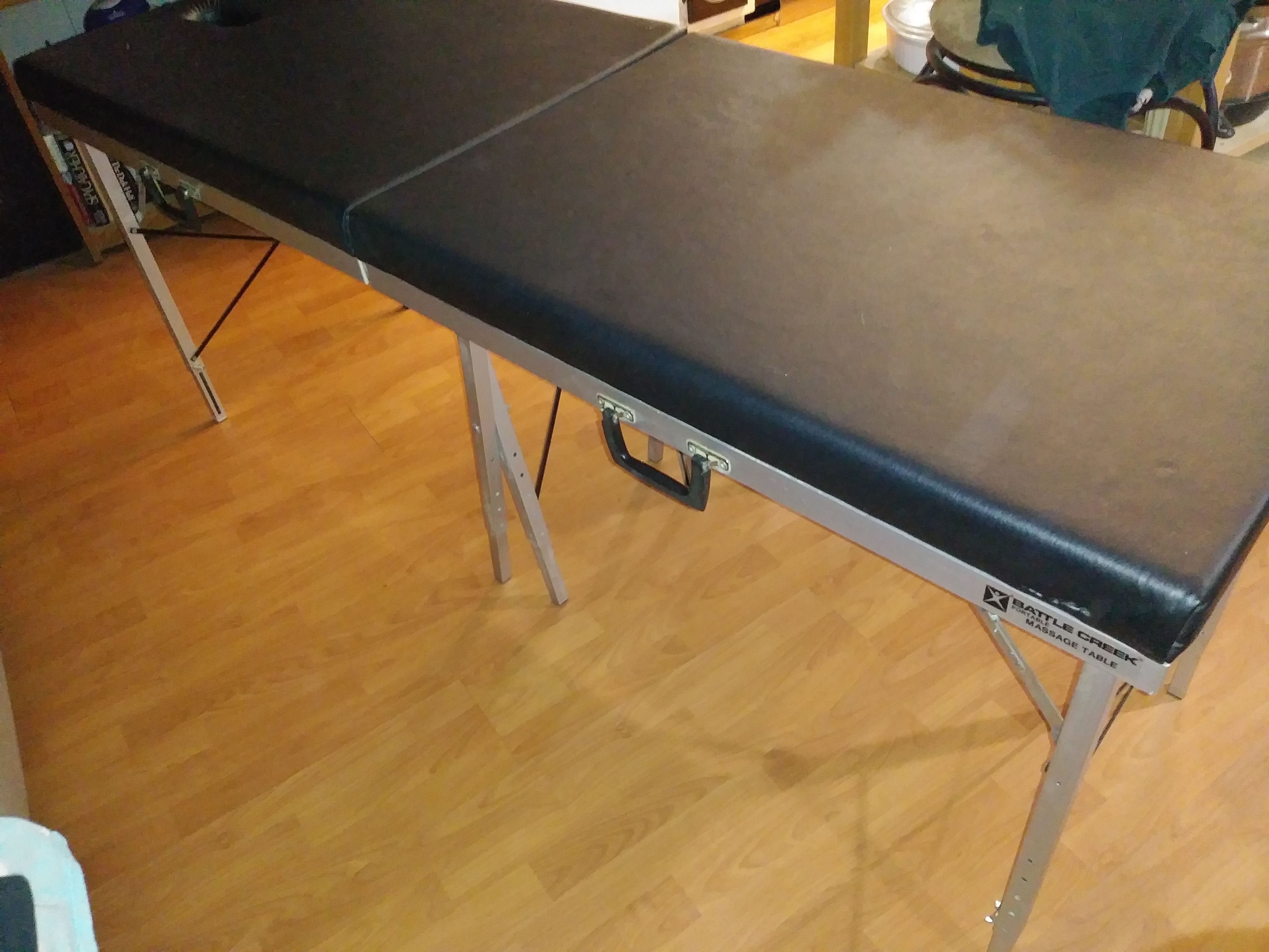 Battle creek portable massage table 041/042. Adjusts 24 to 30 inches high