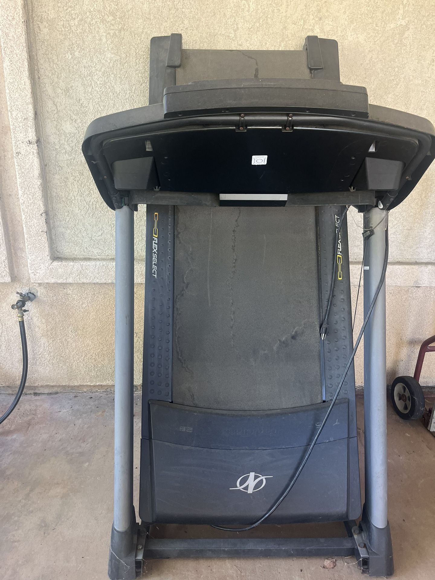 Free treadmill, leather office chair, and weight machine 