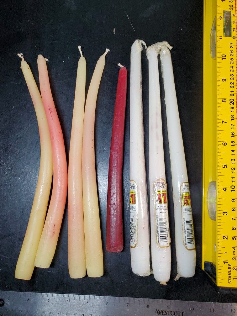 8 vintage taper candles, 12 inches long, manufactured by Candle-lite Company in Cincinnati, OH.