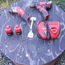 M12 Milwaukee Drill And Flashlight With 2 Batteries And Charger 