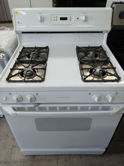 GE white 4-burner gas stove - Free delivery