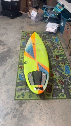 Carabella shapes epoxy surfboard used