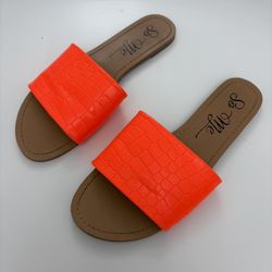 Orange and brown sandals