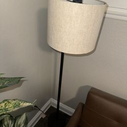 black metal lamp with beige shade tall floor lamp