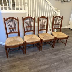 4 wheat back dining wood chairs with rush seats 41"T x 20"W x 18"D 18" Seat height Price is firm