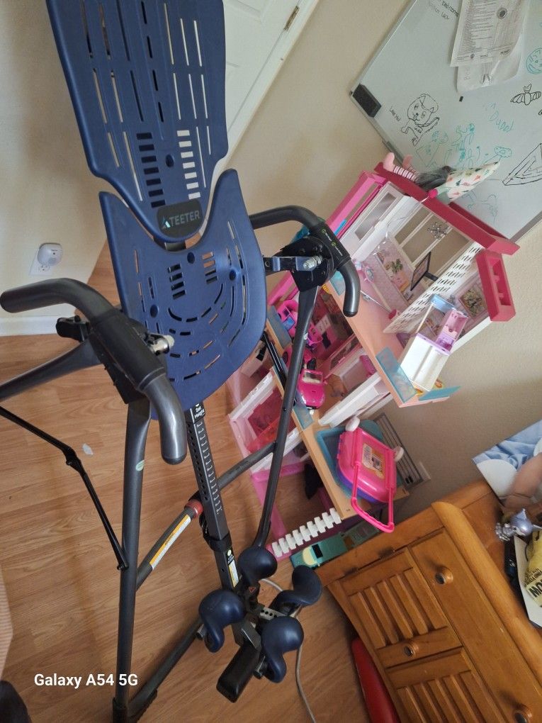 Teeter for back pain