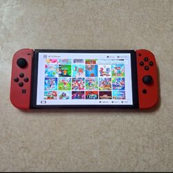 NINTENDO SWITCH OLED with OVER 125 POPULAR SWITCH GAMES