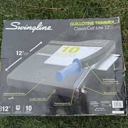 Guillotine trimmer swingline